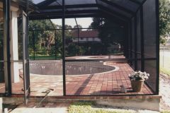 Brick pavers around swimming pool and new interior surface