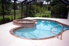 Pool renovation including raised spa, coping, tile, deck and interior resurface