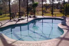 inground swimming pool, coping, deck and interior