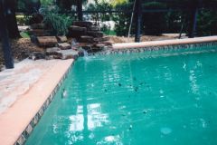 rock water fall added to pool