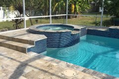 raised spa, travertine deck