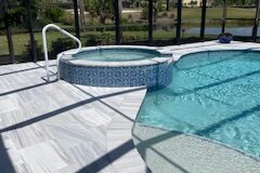 marble deck, spa, tan shelf, tile and interior
