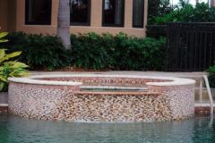 Tiled spa with spill over