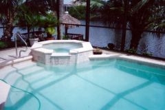 spa addition to pool including new interior, coping, tile and deck