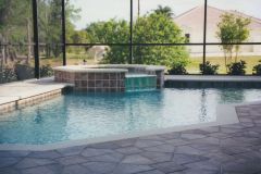 Raised spa, paver deck, swimming pool remodel