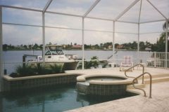 raised spa, paver deck, brick coping and planter wall & swimming pool renovation